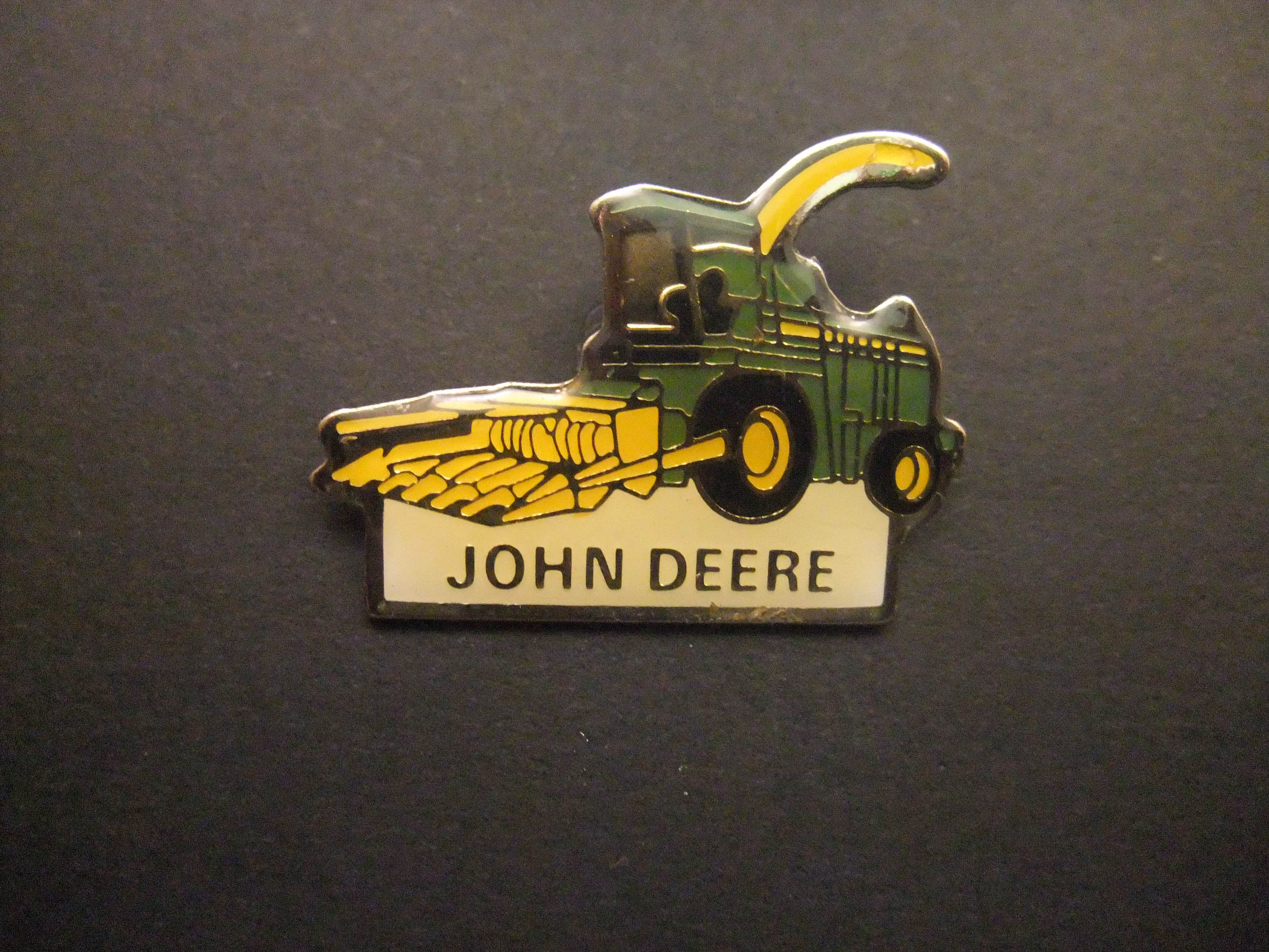 John Deere tractor ( landbouwmachines) met ploeg